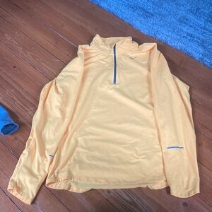 Nike running dry,Canary yellow size small unisex it’s like a medium large woman